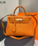 Bolsa Hermes Kelly 28 - Laranja Claro/Dourado