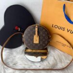 Bolsa Louis Vuitton Boite Chapeau Souple MM - Marrom/Bege