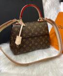 Bolsa Louis Vuitton Cluny BB - Bege