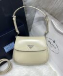 Bolsa Prada Cleo com Aba - Bege