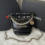 Bolsa Chanel 22 Bag Mini Preto/Dourado