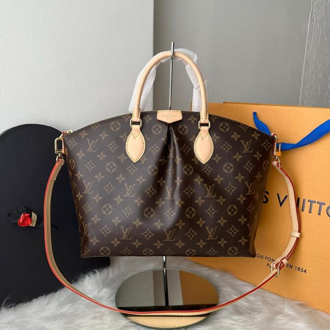 Bolsa Louis Vuitton Boétie MM - Marrom