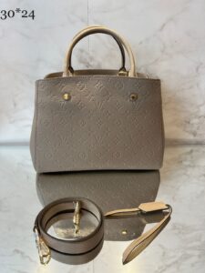 Bolsa Louis Vuitton Montaigne Empreinte - Bege