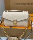 Bolsa LV Pochette Métis East West Empreinte - Creme