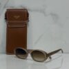Óculos Solar Celine Oval com Assinatura - Marrom