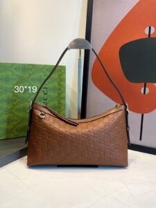 Bolsa Gucci Emblen Média GG-Caramelo
