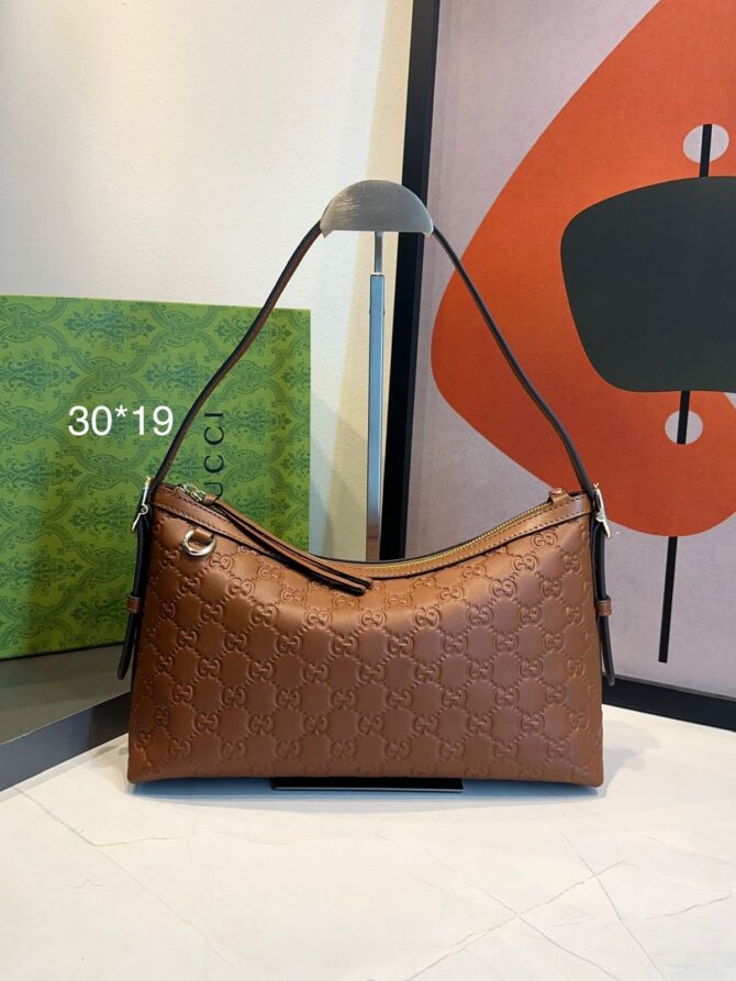 Bolsa Gucci Emblen Média GG - Imagem 4