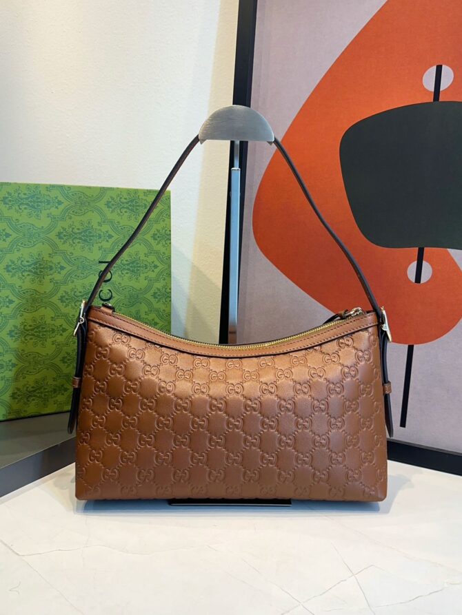 Bolsa Gucci Emblen Média GG - Imagem 7