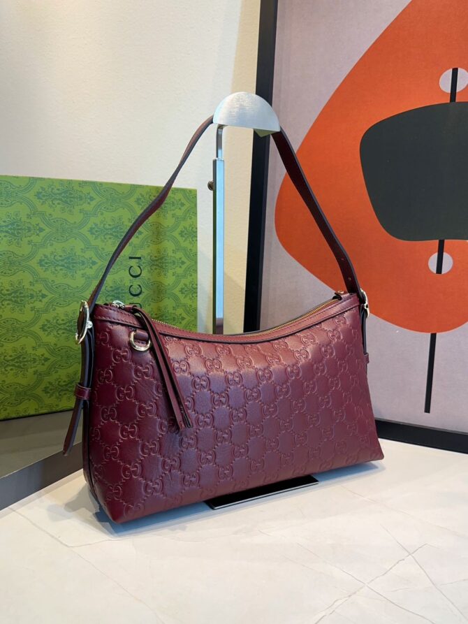 Bolsa Gucci Emblen Média GG - Imagem 18