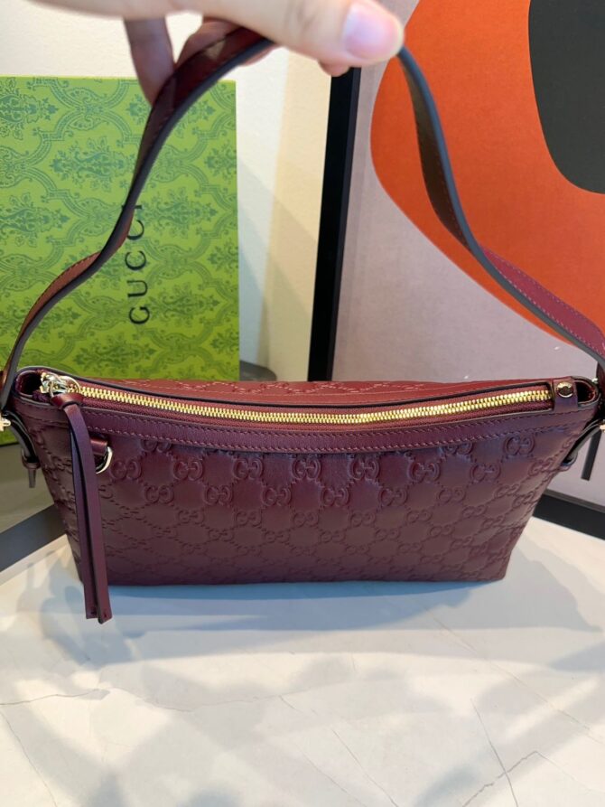 Bolsa Gucci Emblen Média GG - Imagem 22
