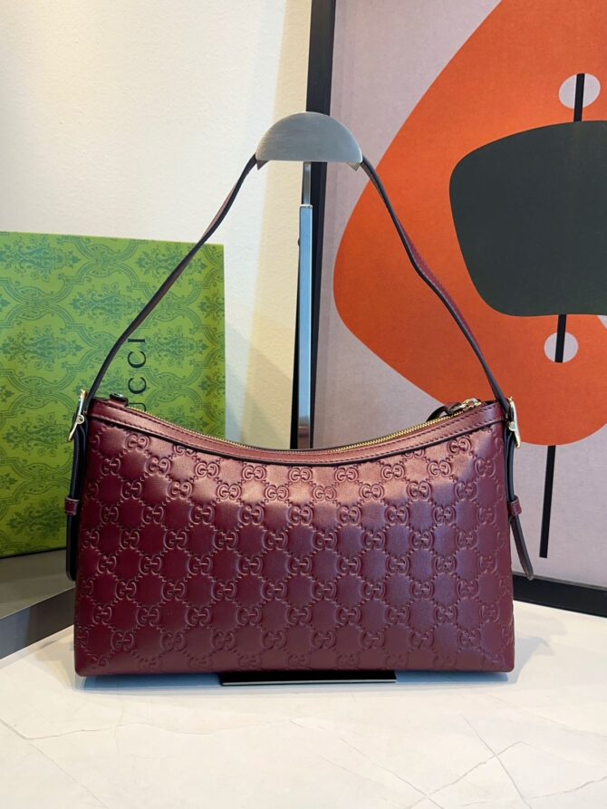 Bolsa Gucci Emblen Média GG - Imagem 23