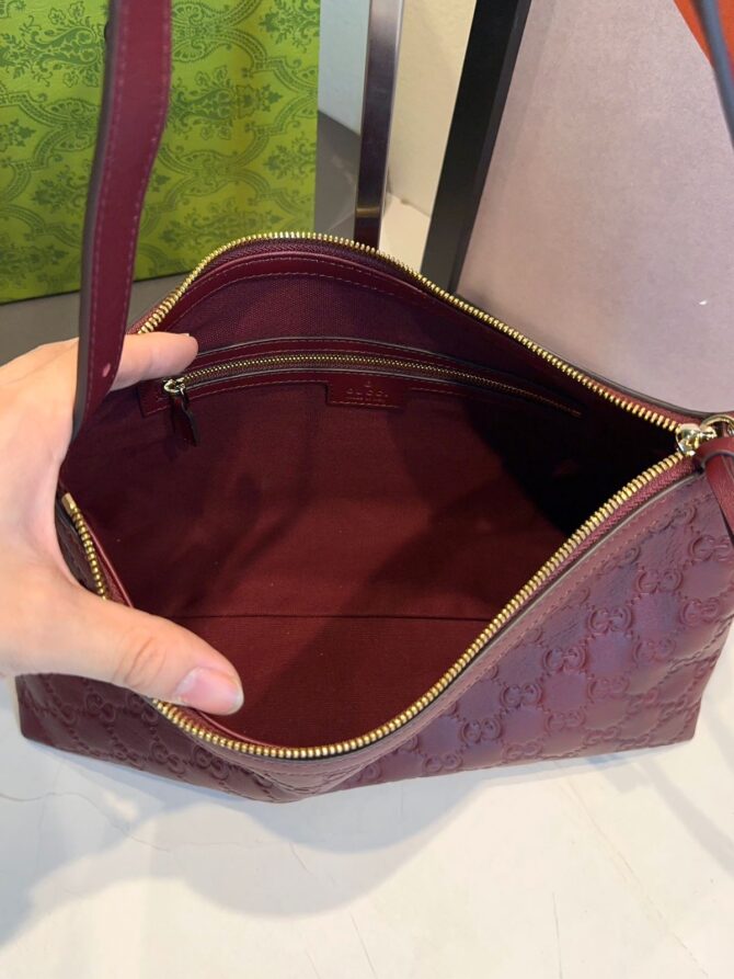 Bolsa Gucci Emblen Média GG - Imagem 24