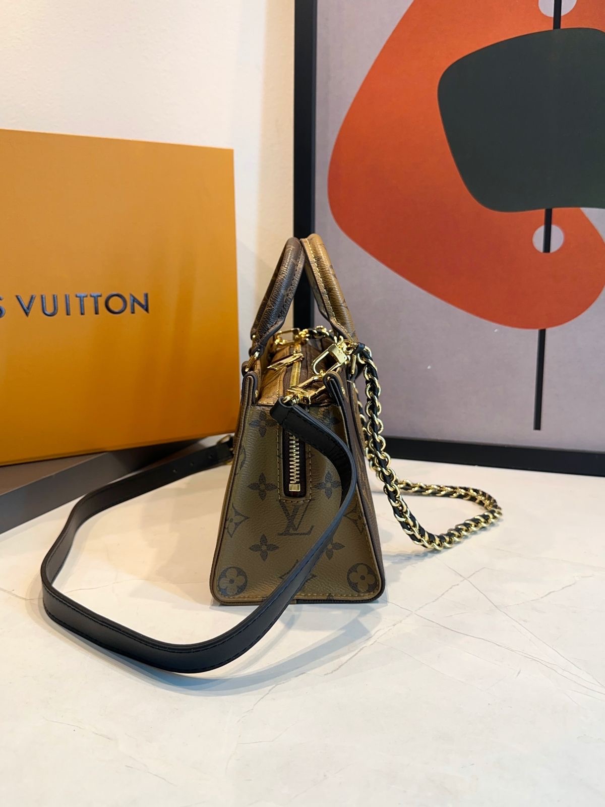 Bolsa LV Onthego East West Chain - Imagem 4
