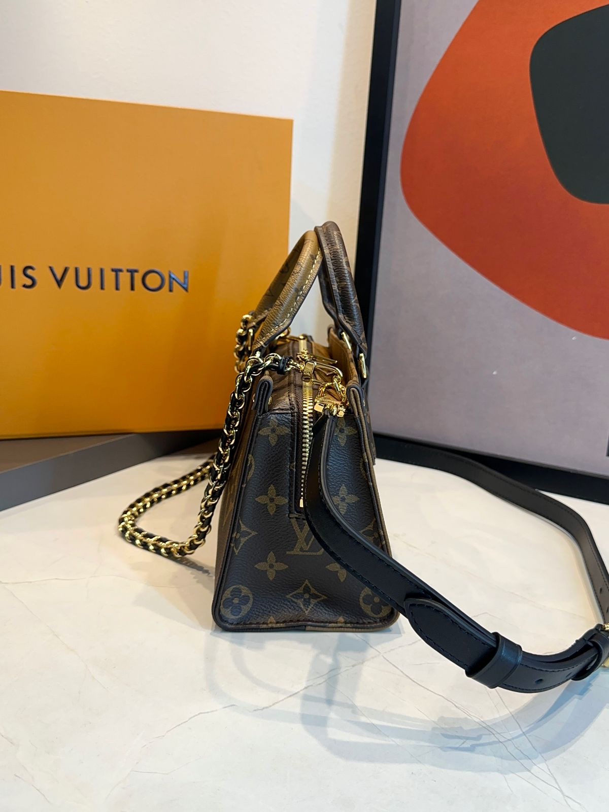 Bolsa LV Onthego East West Chain - Imagem 6