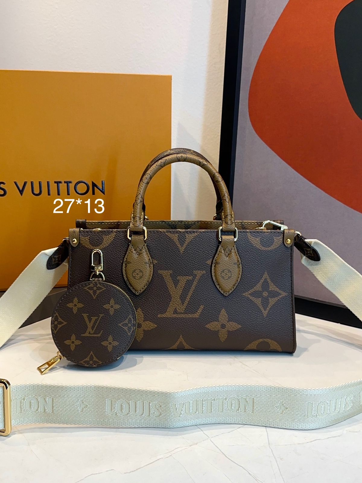 Bolsa LV Onthego East West Chain - Imagem 12